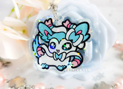 Gamers Guild AZ Bonnies Lab Pokemon: Shiny Sylveon Epoxy Acrylic Keychain Holographic Charm Faire