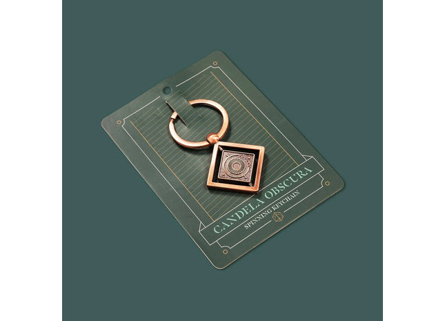 Gamers Guild AZ Critical Kit LTD Candela Obscura: Spinning Keychain Darrington Press